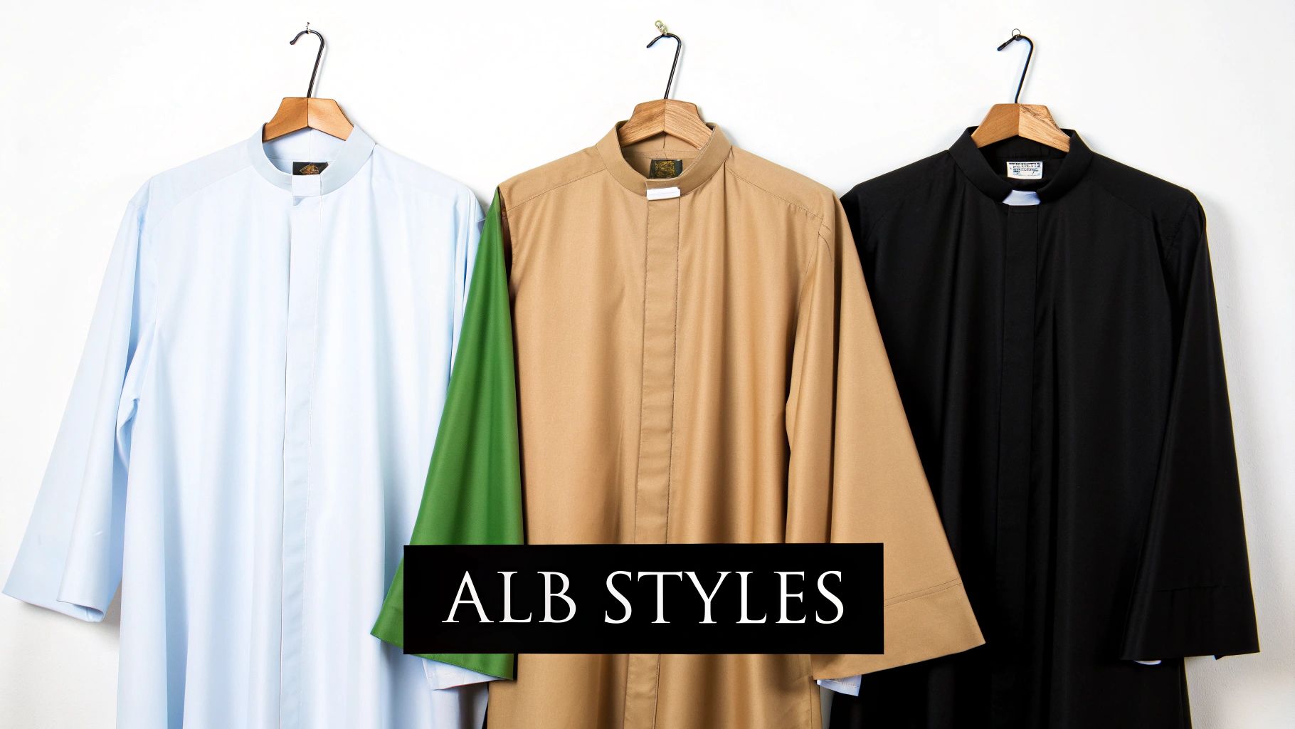 Three albs in light blue, tan, and black hanging on hangers, showcasing different styles.