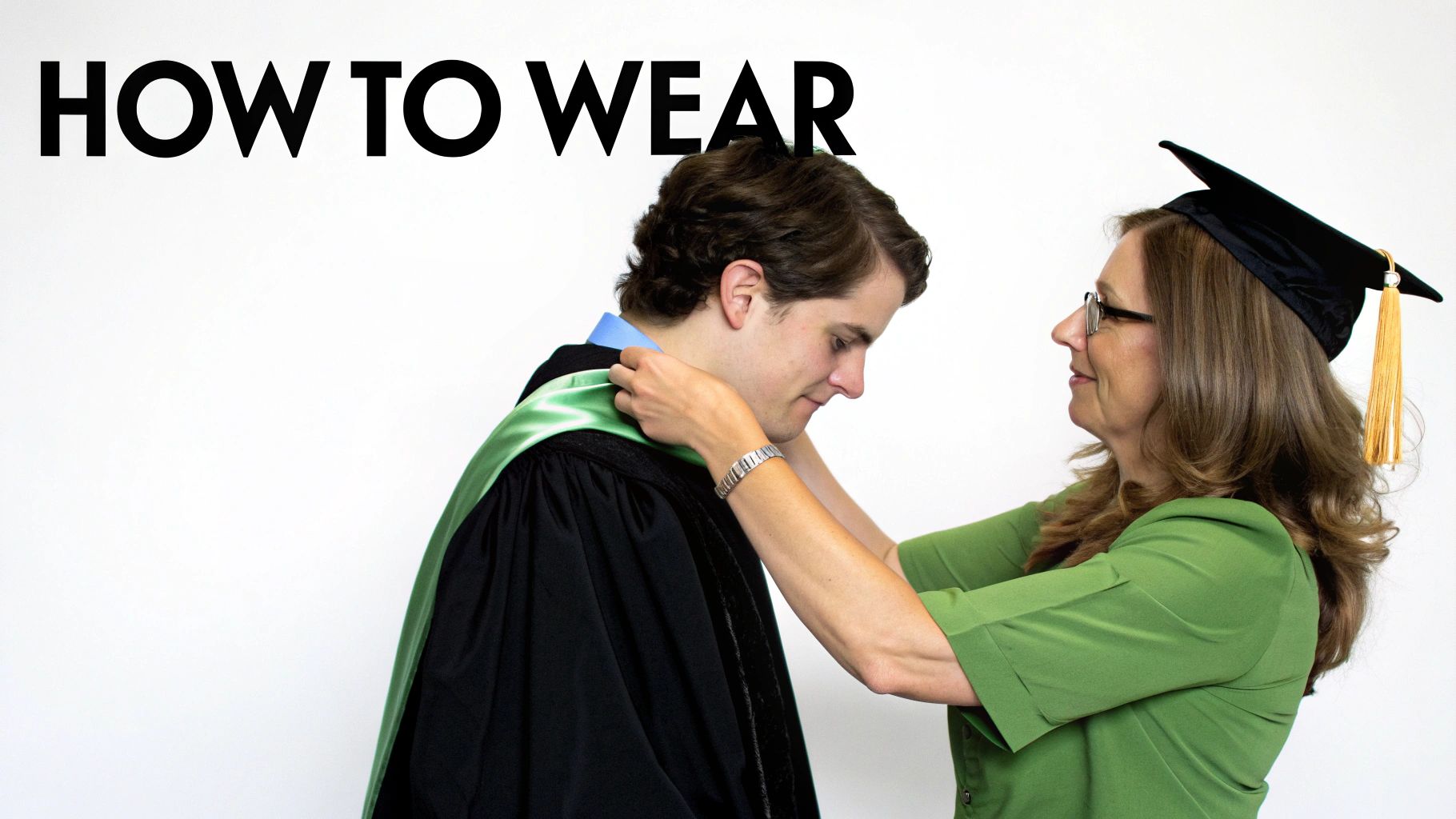 A woman in a graduation cap helps a man put on a green graduation hood over his black gown, demonstrating how to wear regalia.