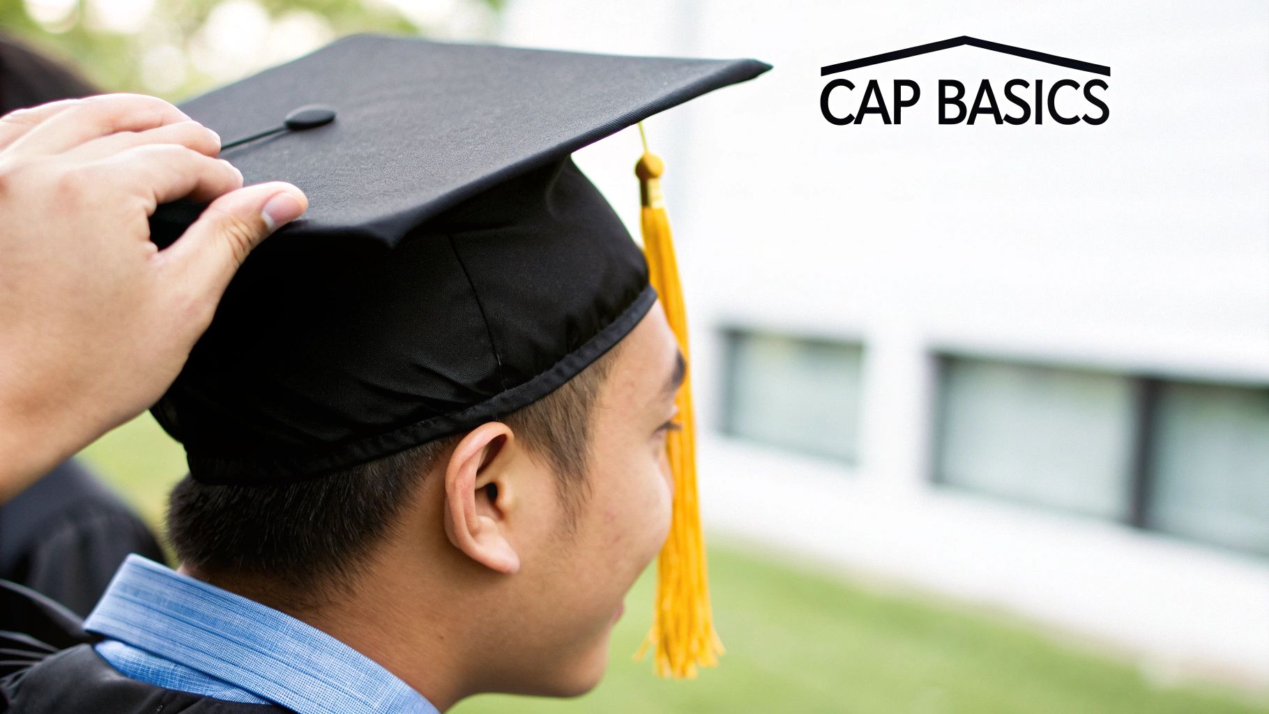 A hand adjusts a black graduation cap with a yellow tassel on a graduate's head, Cap Basics logo.