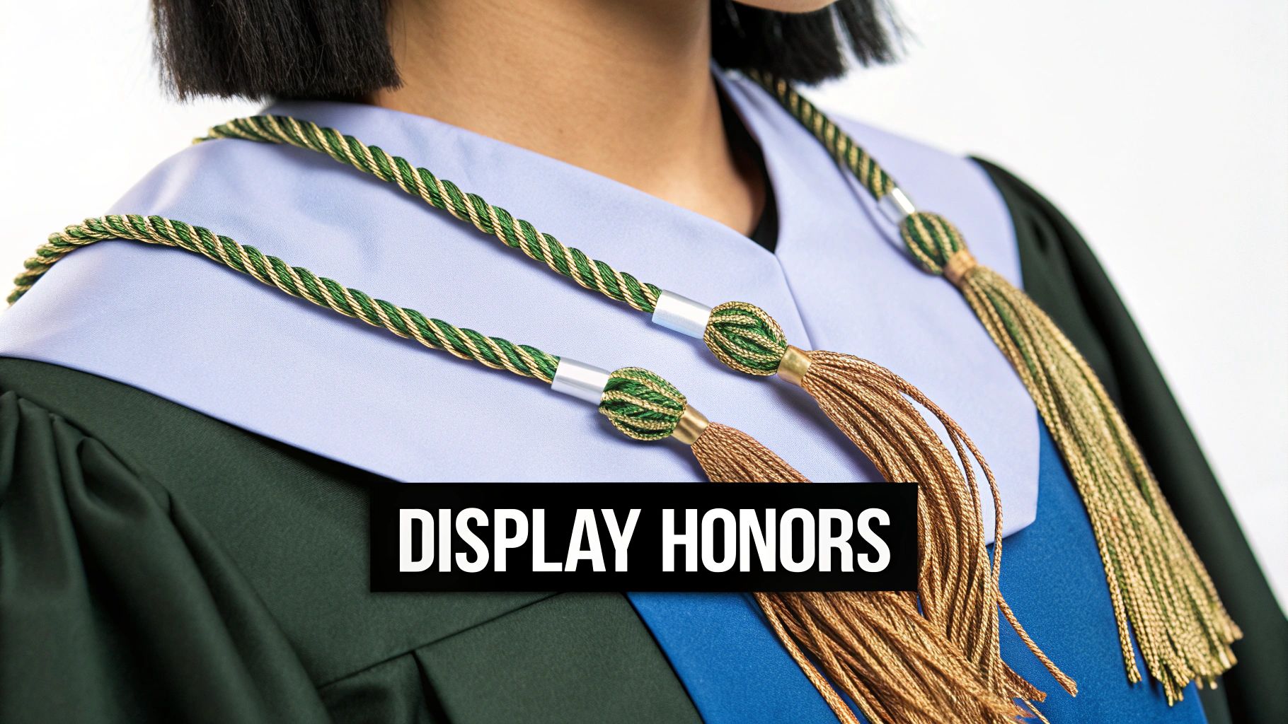 A graduate wearing a purple gown, a stole, and honor cords.