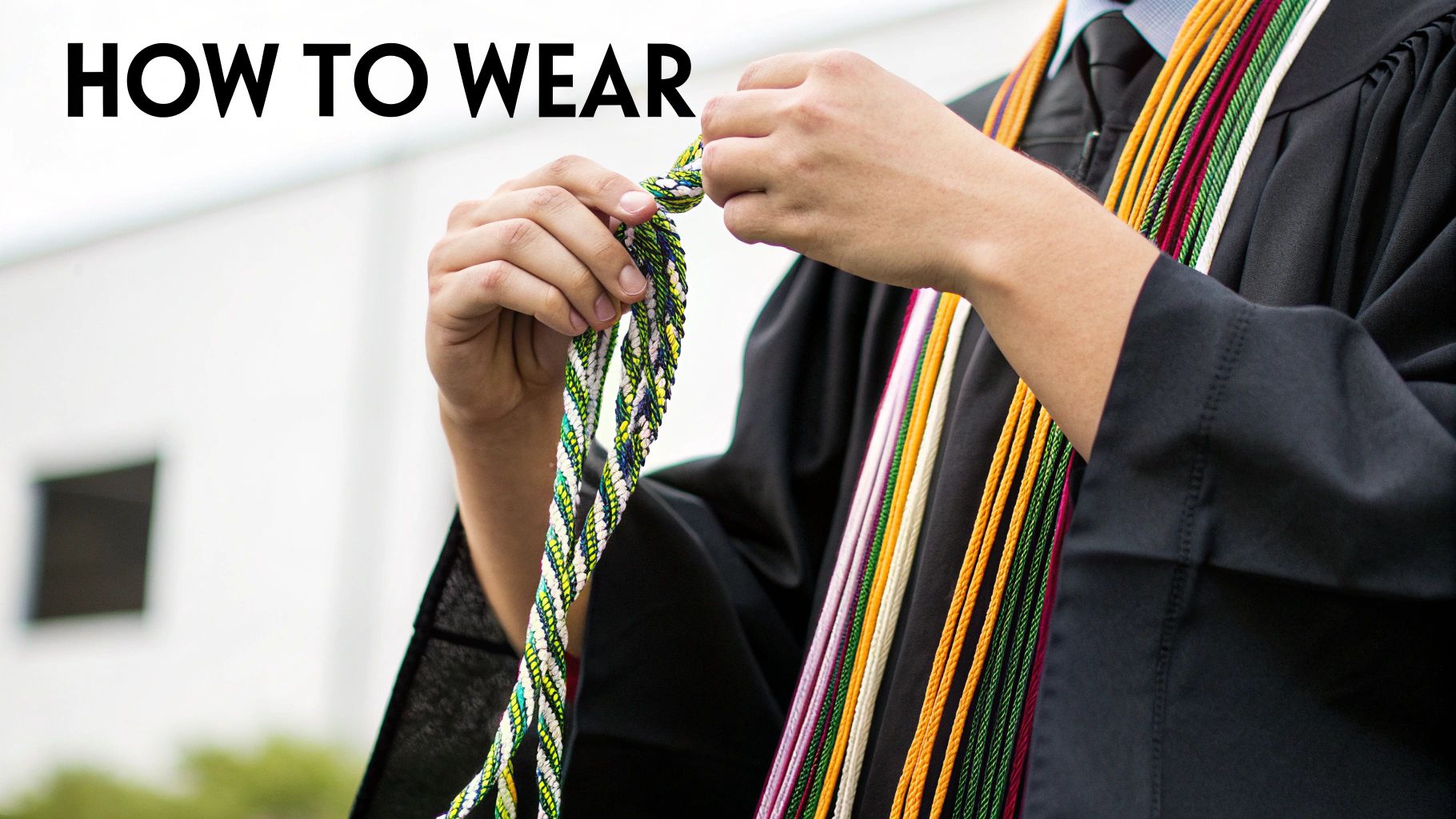 Close-up of a person in a graduation gown adjusting colorful honor cords, with 'HOW TO WEAR' text.