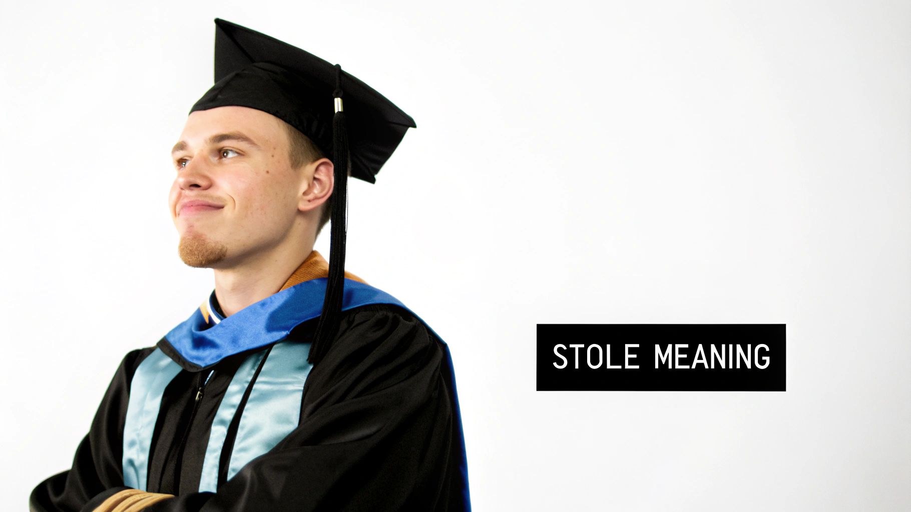 A smiling male graduate in a black cap and gown with a blue stole looks confidently up.
