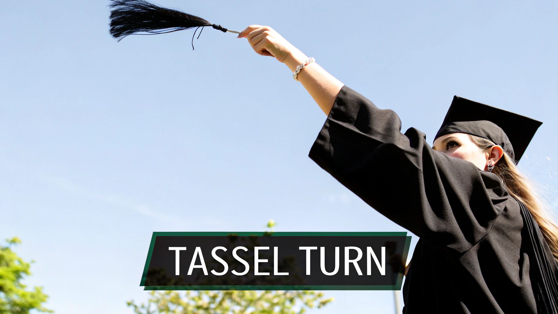 A close-up of a graduation cap with the tassel prominently featured.