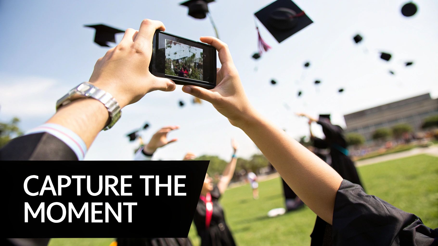 Graduates tossing their caps in the air with a clear blue sky in the background.