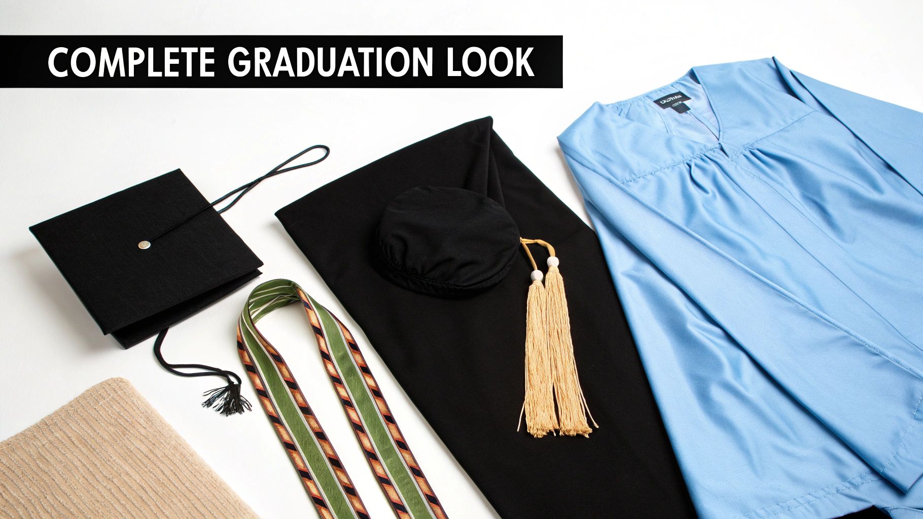 A flat lay of complete graduation attire: blue gown, black cap, stole, and gold tassel.