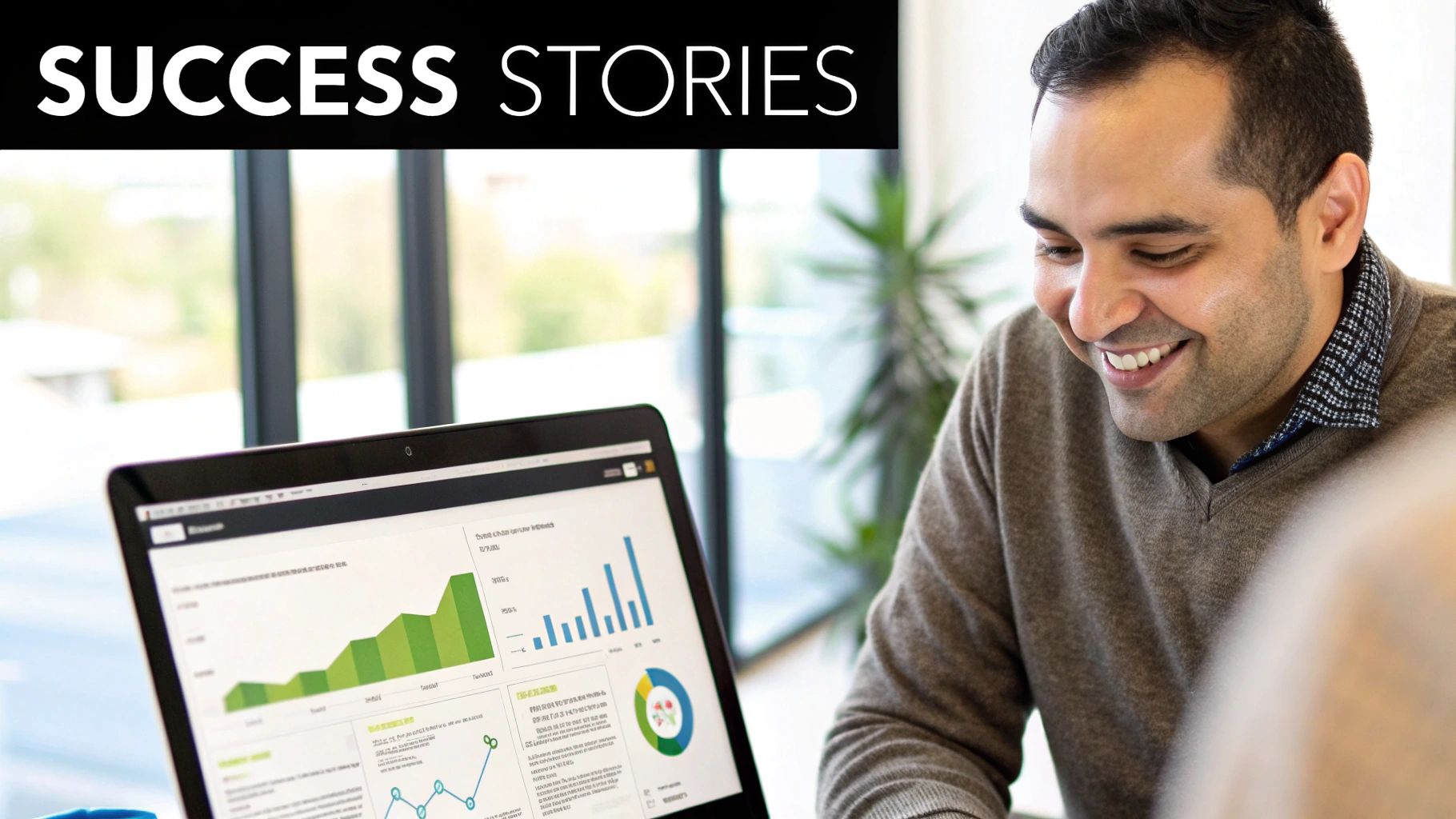 Smiling man looking at a laptop displaying charts and graphs, with "SUCCESS STORIES" text.