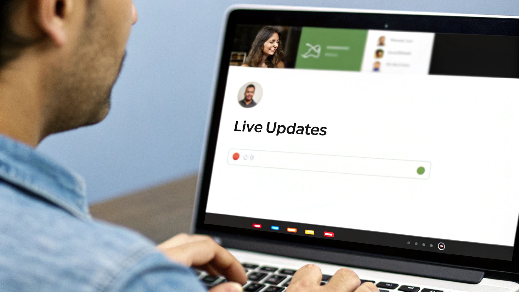 Close-up of a person typing on a laptop displaying a 'Live Updates' dashboard.