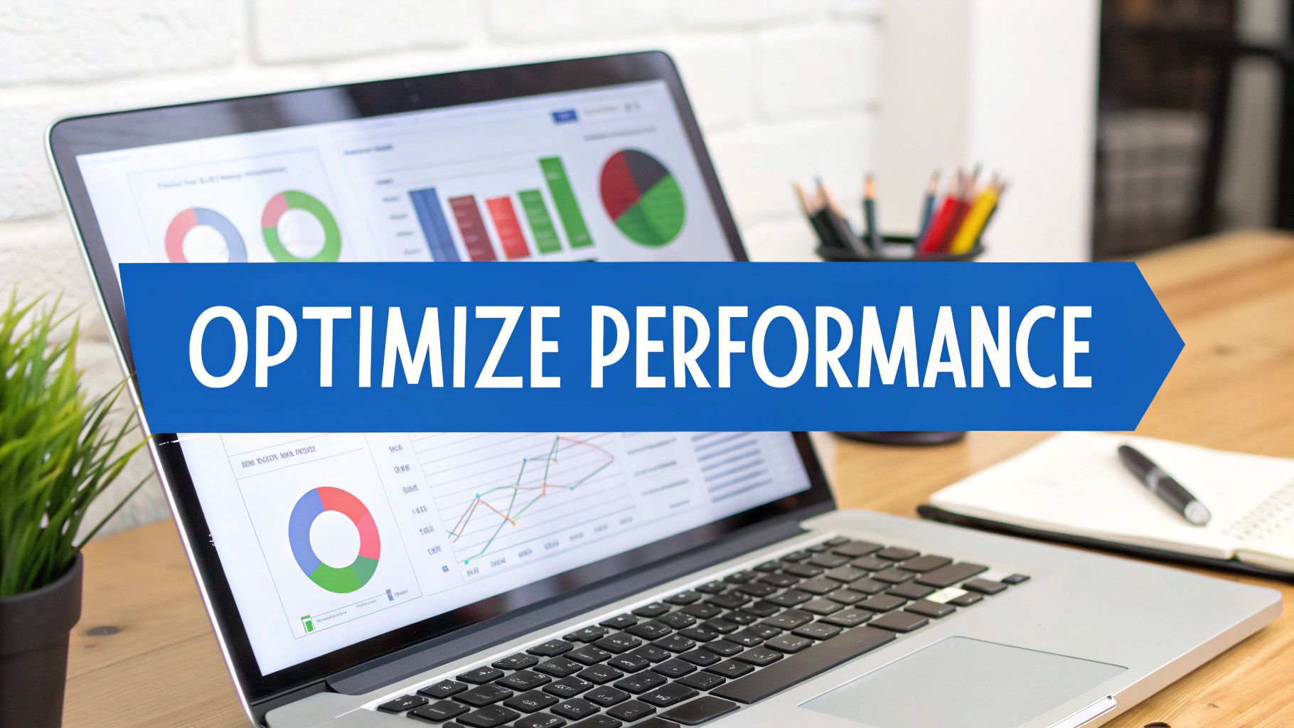 A laptop on a desk showing performance charts and graphs, with an 'OPTIMIZE PERFORMANCE' banner.