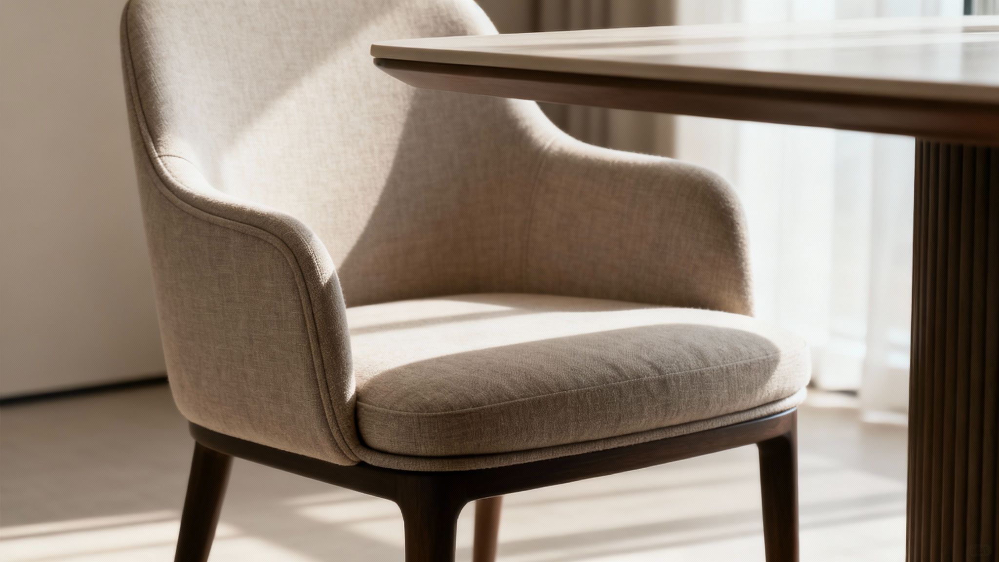 Person examining the joint of a wooden dining chair in a furniture store.