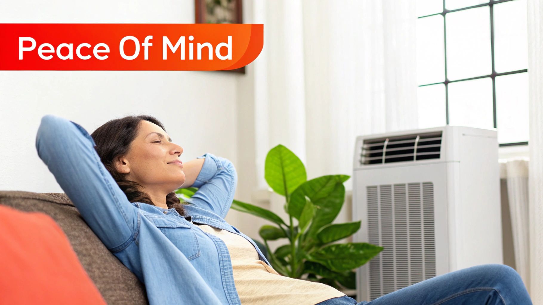 A close-up of a person putting money into a piggy bank with an air conditioner in the background.