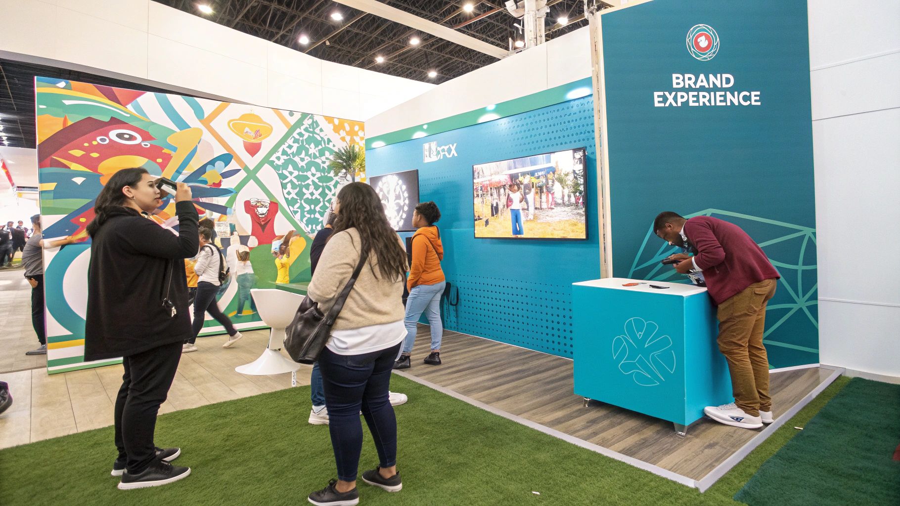 A conference display booth with strong, consistent branding and messaging.