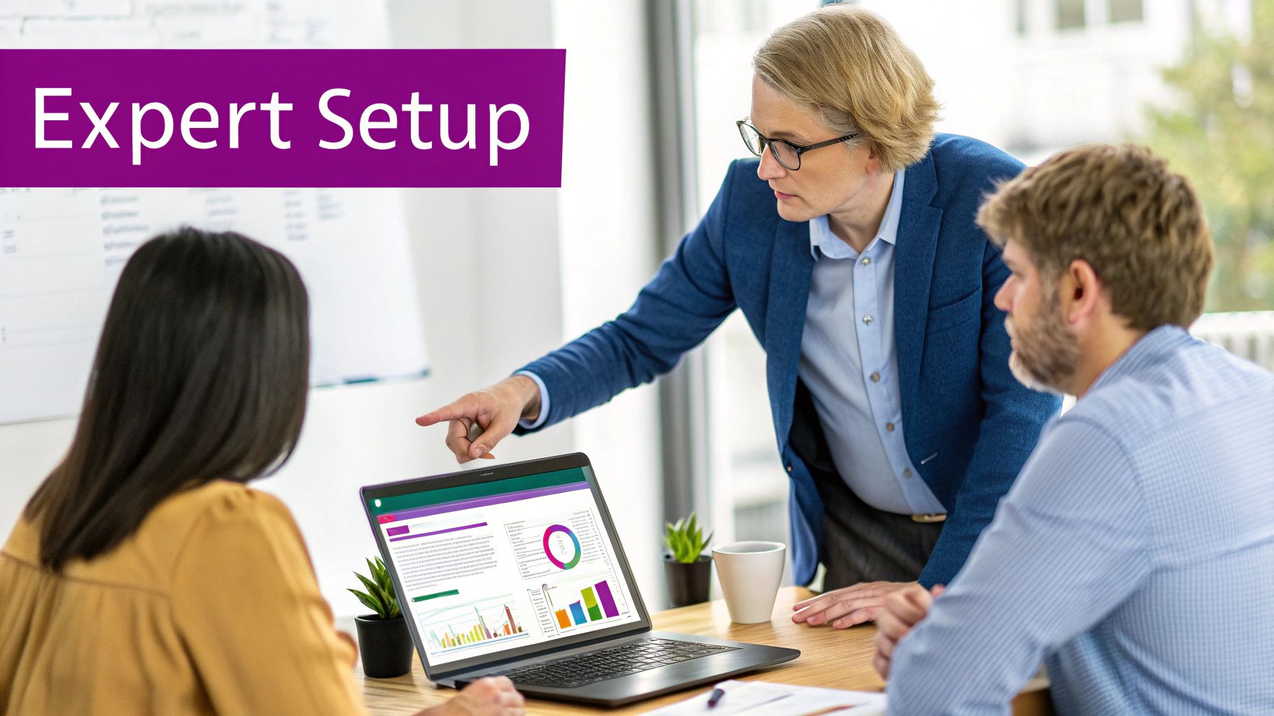 An IT professional assisting a business owner with a cloud setup on a computer screen.