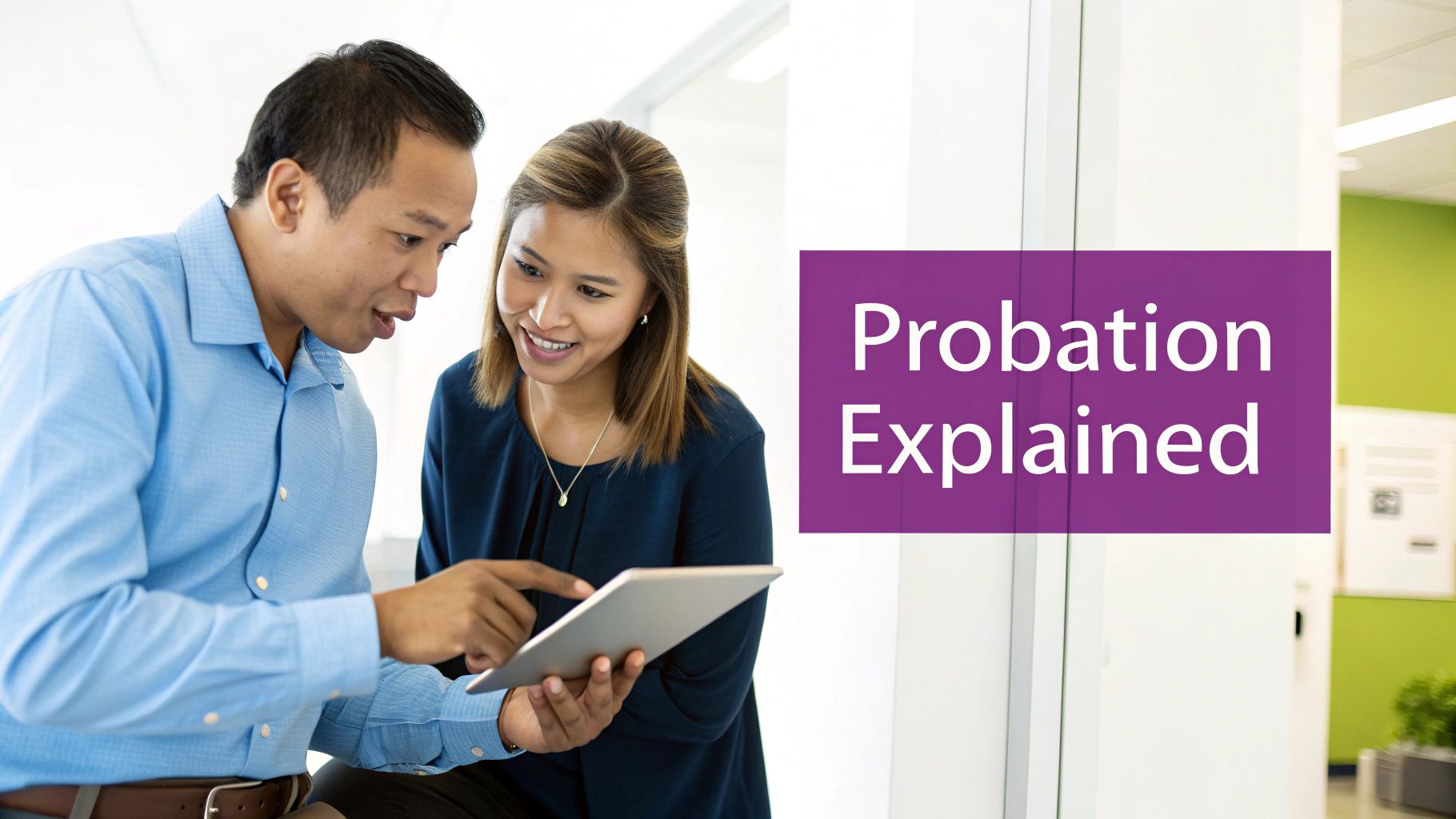 Two colleagues discussing information on a digital tablet in an office, with 'Probation Explained' text overlay.