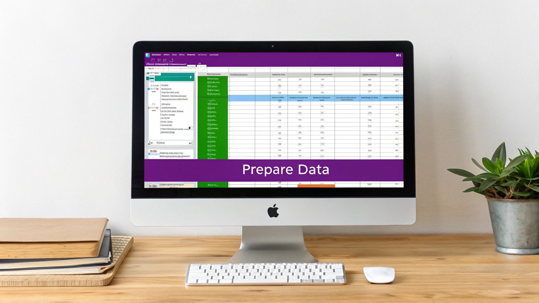 An Apple iMac computer on a wooden desk displays a data preparation spreadsheet interface.