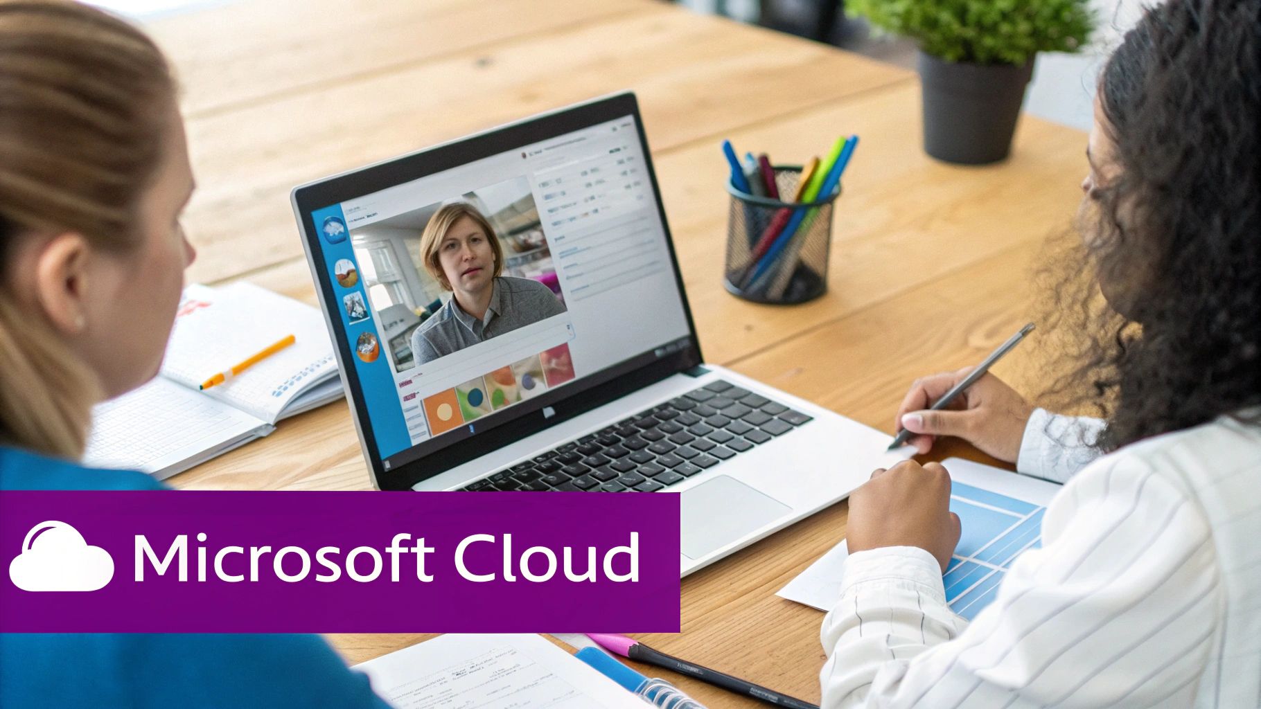 Two people on a video call, collaborating on a laptop with Microsoft Cloud branding.