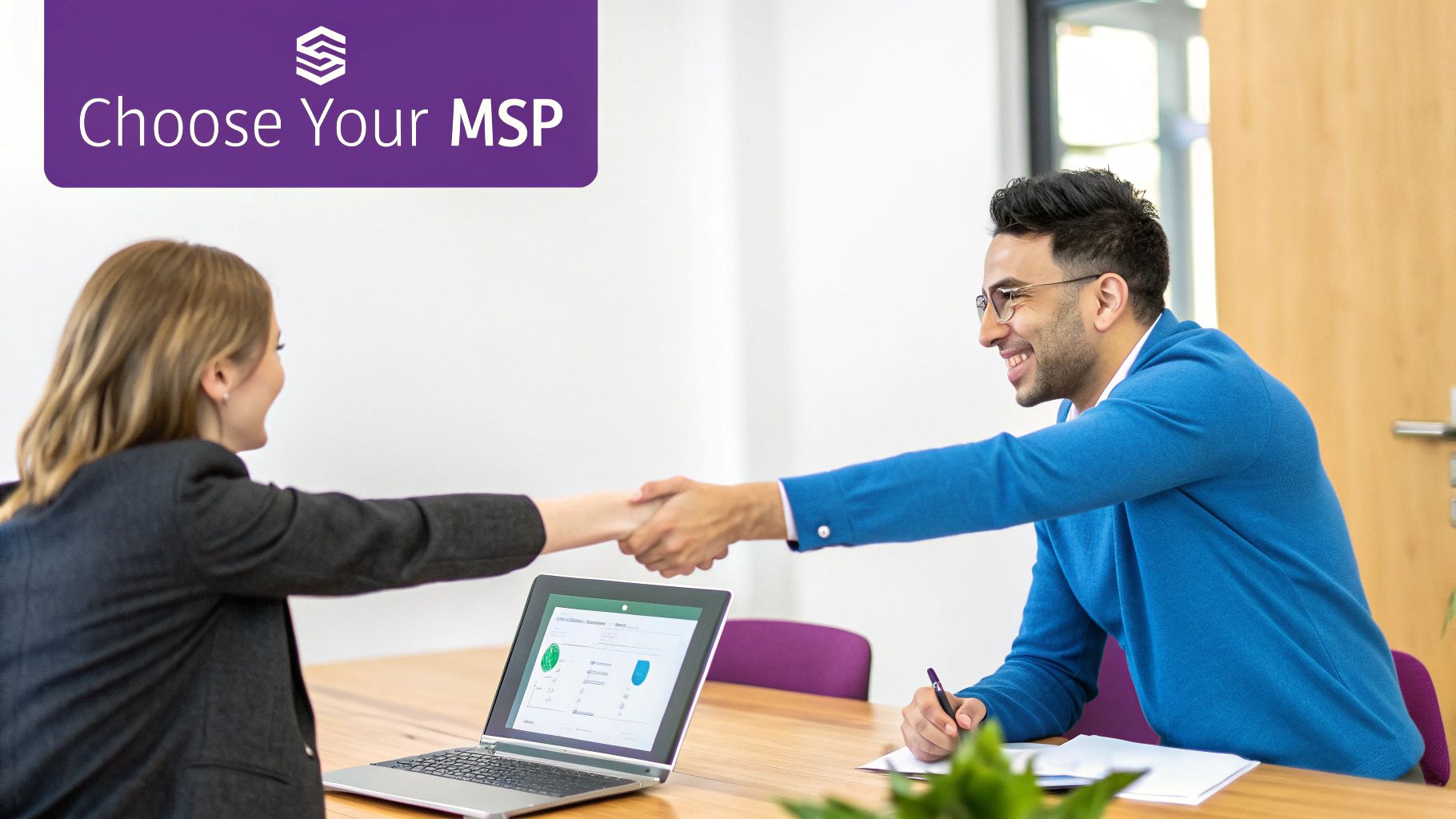 A person at a desk carefully reviewing documents and a laptop screen, representing the process of choosing an IT provider.