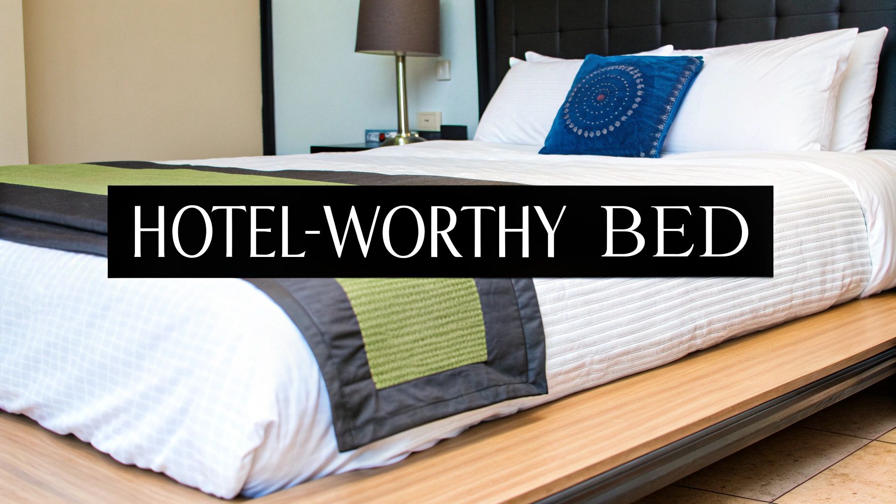 A beautifully styled king-size bed with layered pillows and throws, showcasing a luxurious aesthetic.