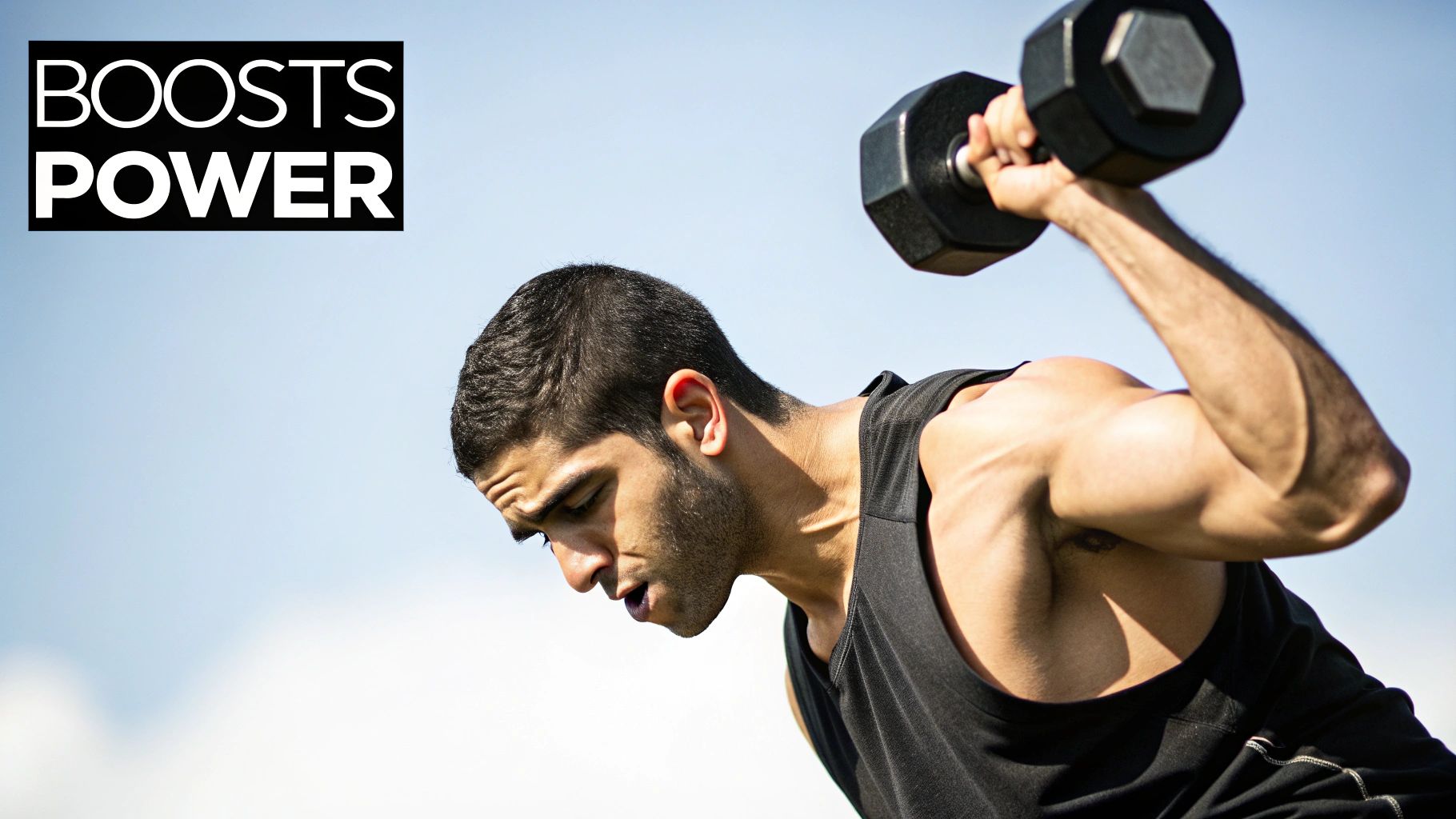 A person's muscular back and arms as they lift a heavy barbell in a gym setting