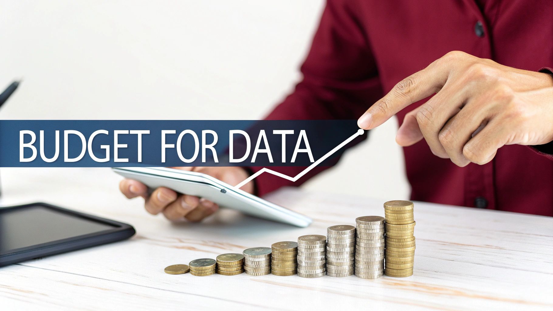 Person pointing at 'BUDGET FOR DATA' text with an upward trend and increasing coin stacks.
