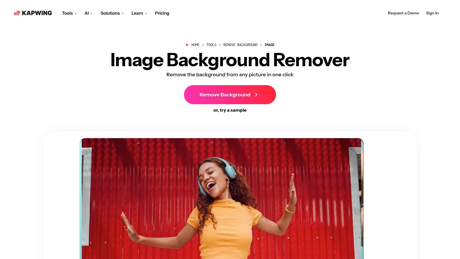 Kapwing’s interface showing an image of a woman with the background removed and options for further editing.