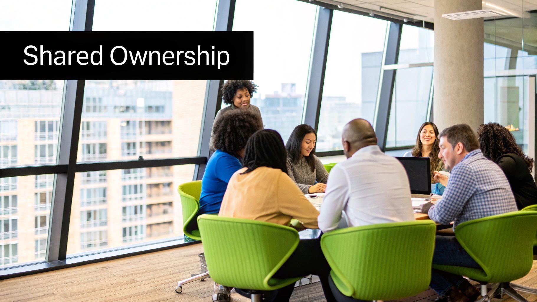 A diverse team collaborates around a table, fostering a positive and secure work environment.
