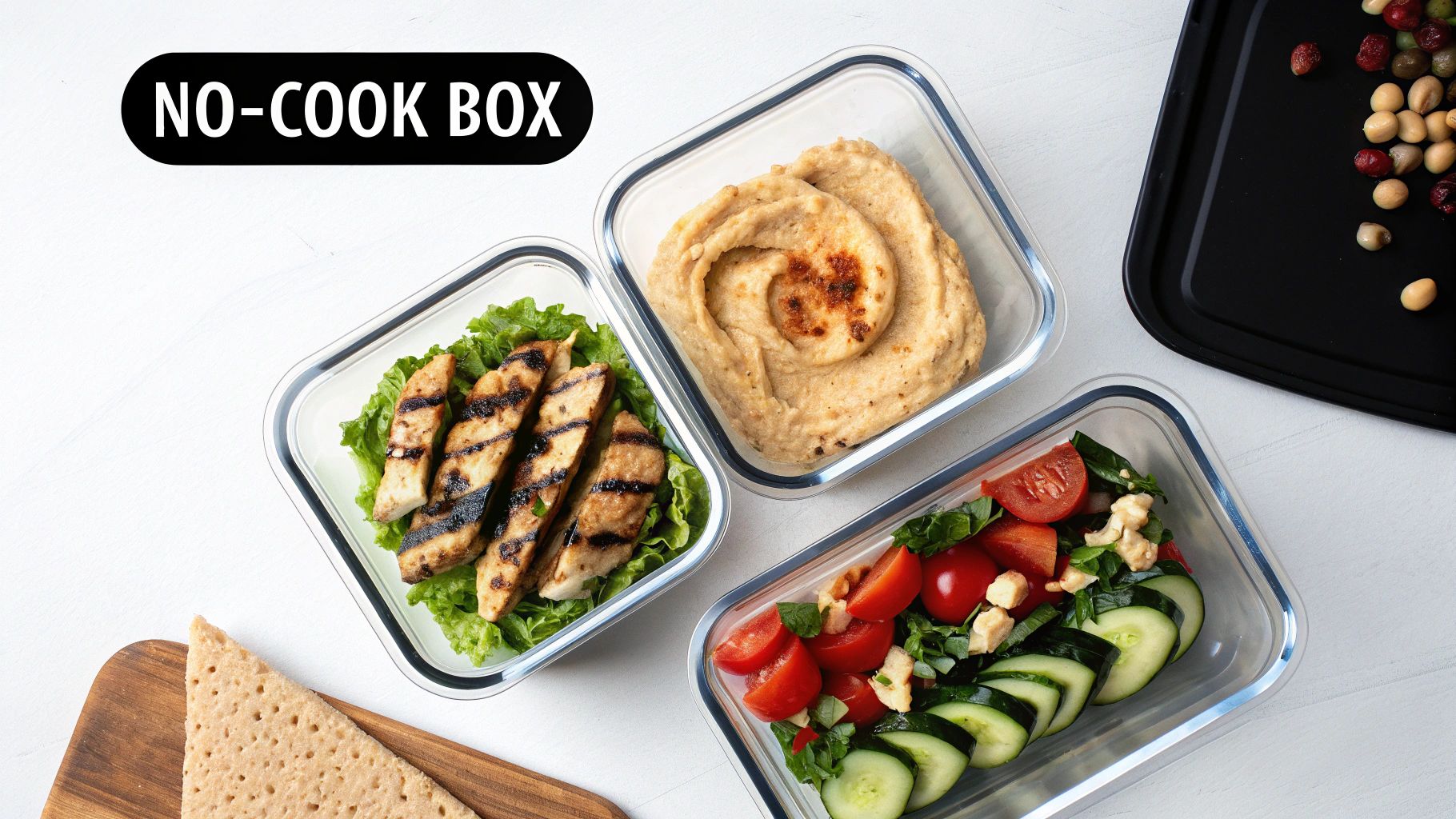Three glass meal prep containers with healthy no-cook meals: grilled chicken, hummus, and fresh salad.