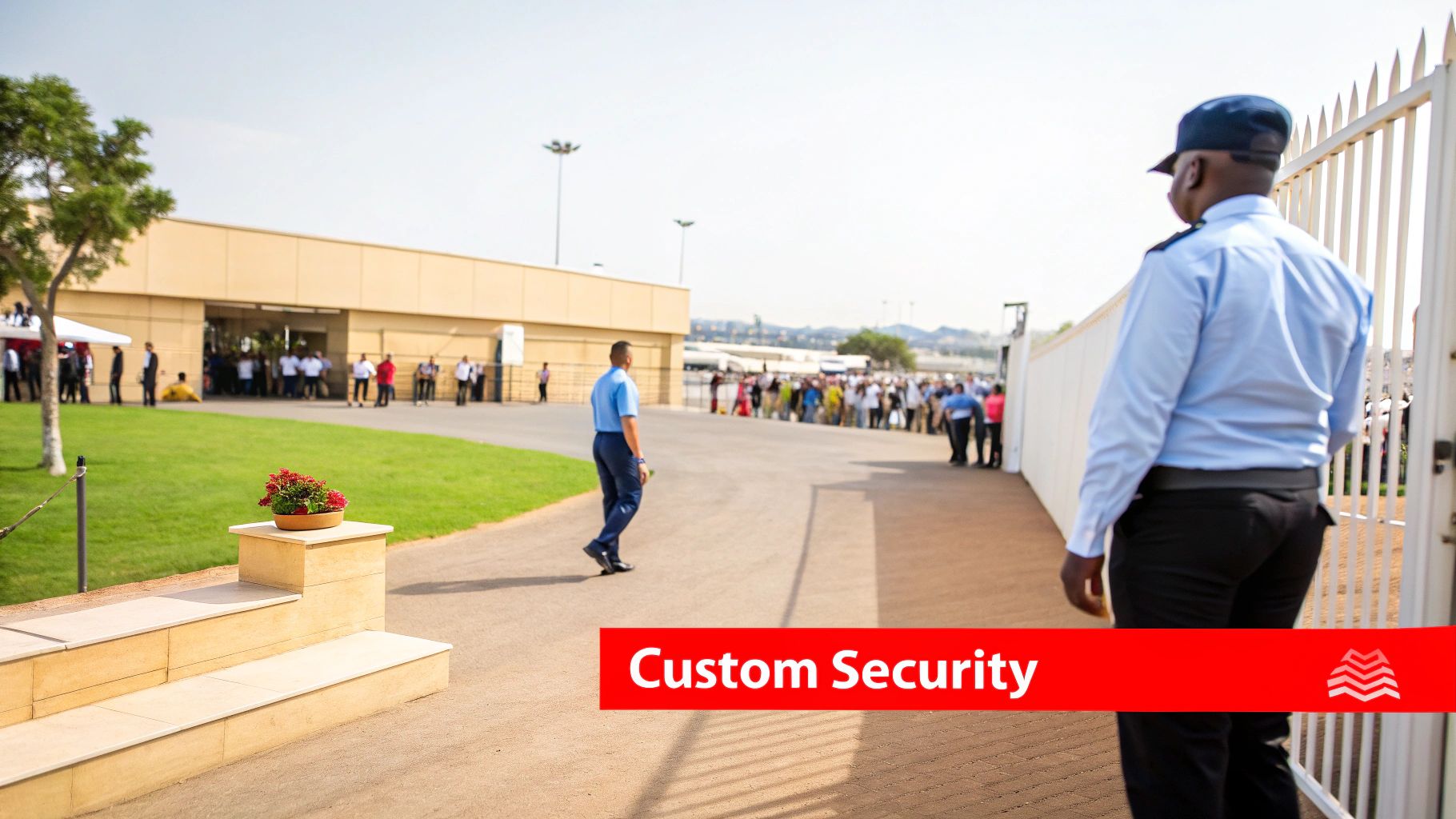 7 Devastating Event Security Mistakes to Avoid: A Pro Guide to Safer Events 2 Security guards oversee a large crowd entering a facility with a 'Custom Security' banner visible.