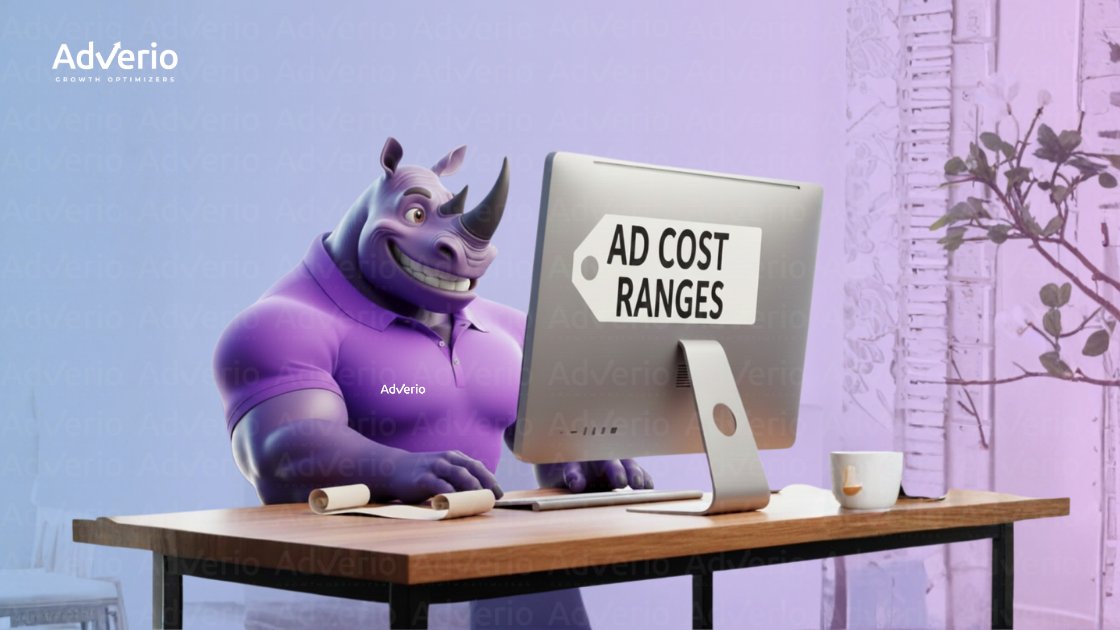 What Is the Real Cost of Amazon Advertising? 20 A friendly purple rhinoceros character at a desk, looking at a monitor displaying 'AD COST RANGES'.