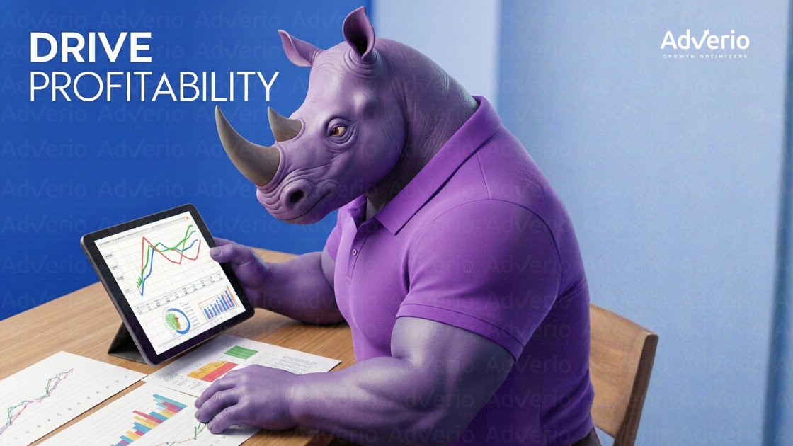 A purple rhinoceros reviews financial charts on a tablet and papers, with 'DRIVE PROFITABILITY' text on the left.