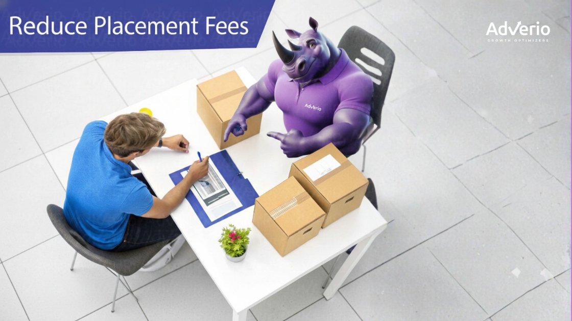 Amazon FBA Inbound Placement Fees: Profit Protection Playbook 11 A man signs documents at a table with a purple rhino mascot, surrounded by cardboard boxes.