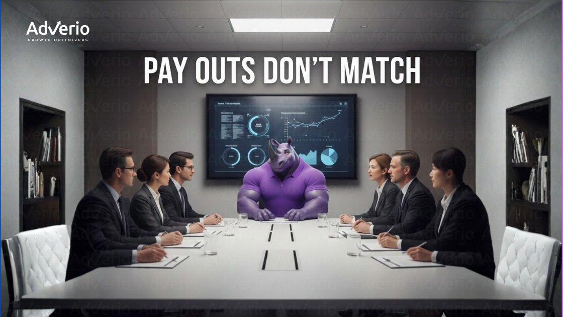 A purple rhino character leads a business meeting in a conference room with six people.