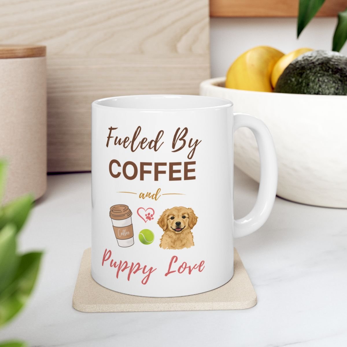 A white ceramic mug with 'Fueled By COFFEE and Puppy Love' text and illustrations of a puppy, coffee, and tennis ball.