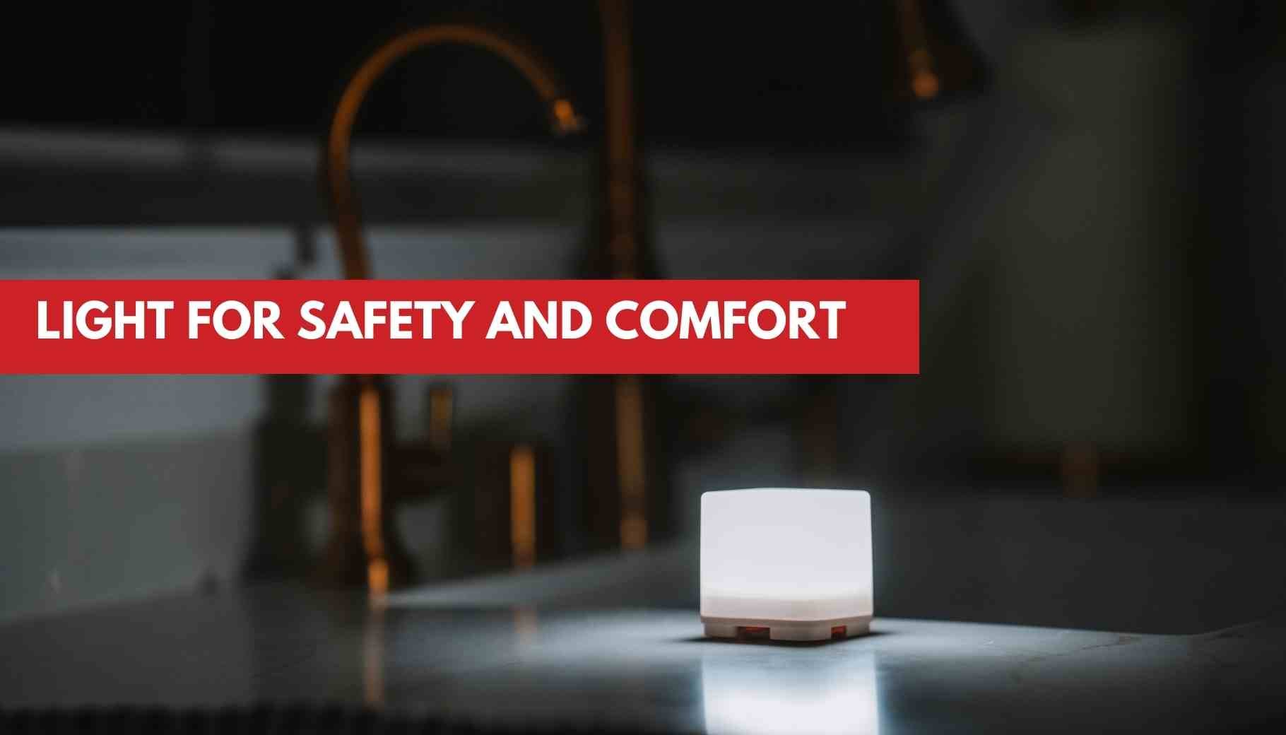 A small, glowing white light illuminates a dark counter, promoting safety and comfort.