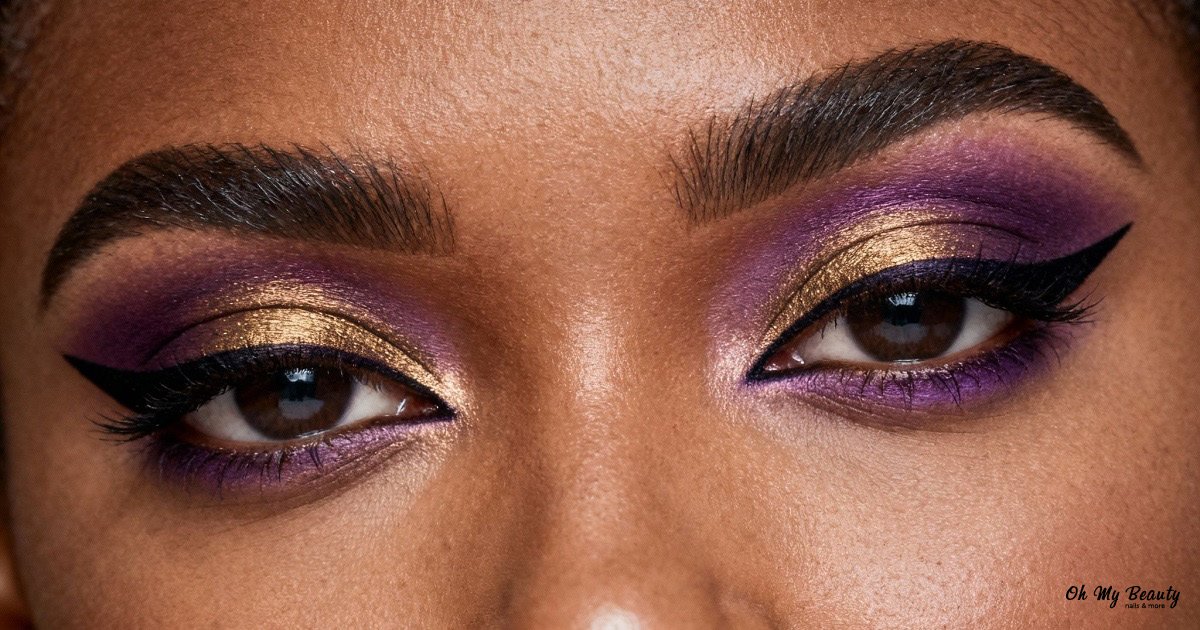 Γυναίκα μελαχρινή με έντονο μακιγιάζ ματιών