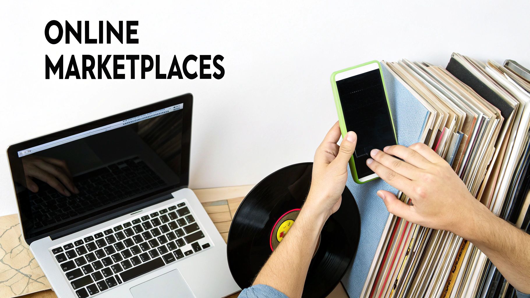 A person uses a laptop and a smartphone to browse online marketplaces for vinyl records and music.