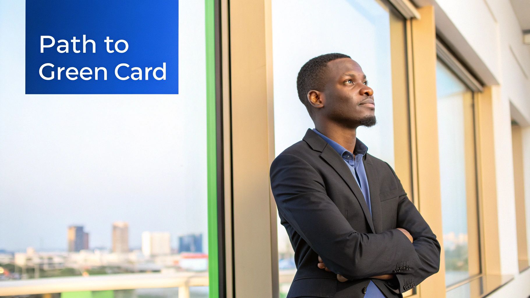 A professional man looking out a window with a city view and 'Path to Green Card' text.