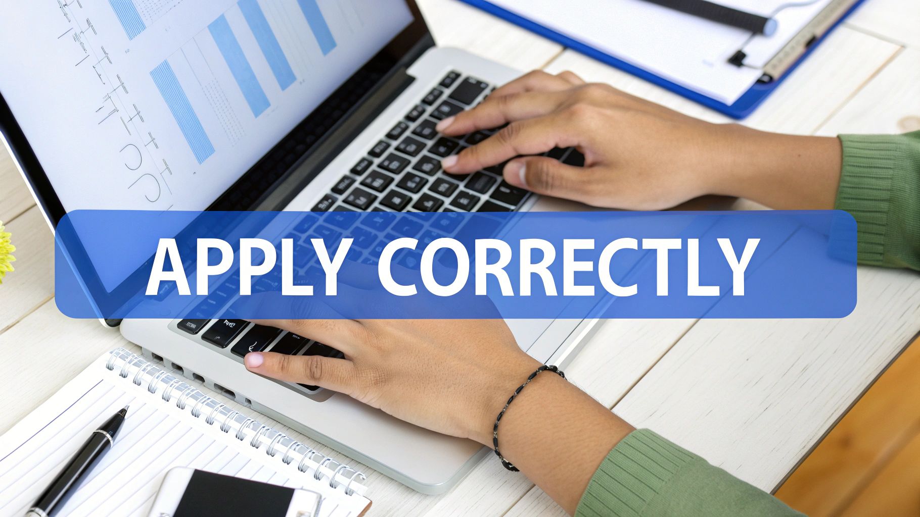 A person carefully filling out a Canadian visa application form on a laptop, with a focused expression.