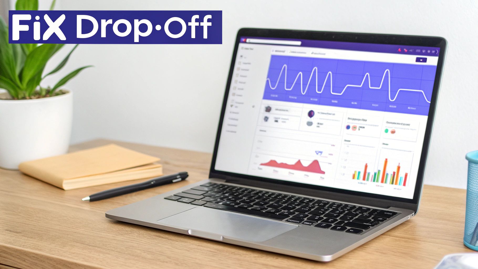 A laptop displaying analytics, a plant, and a notebook on a wooden desk.