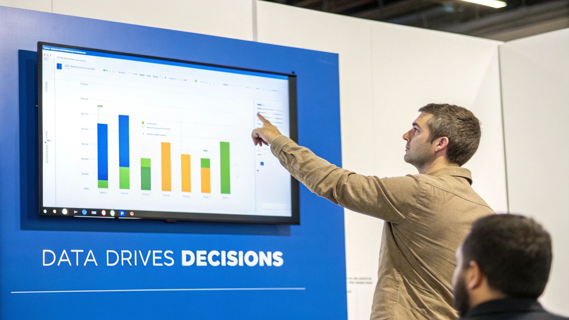 An architect reviewing charts and graphs on a tablet, indicating data-driven decision making.