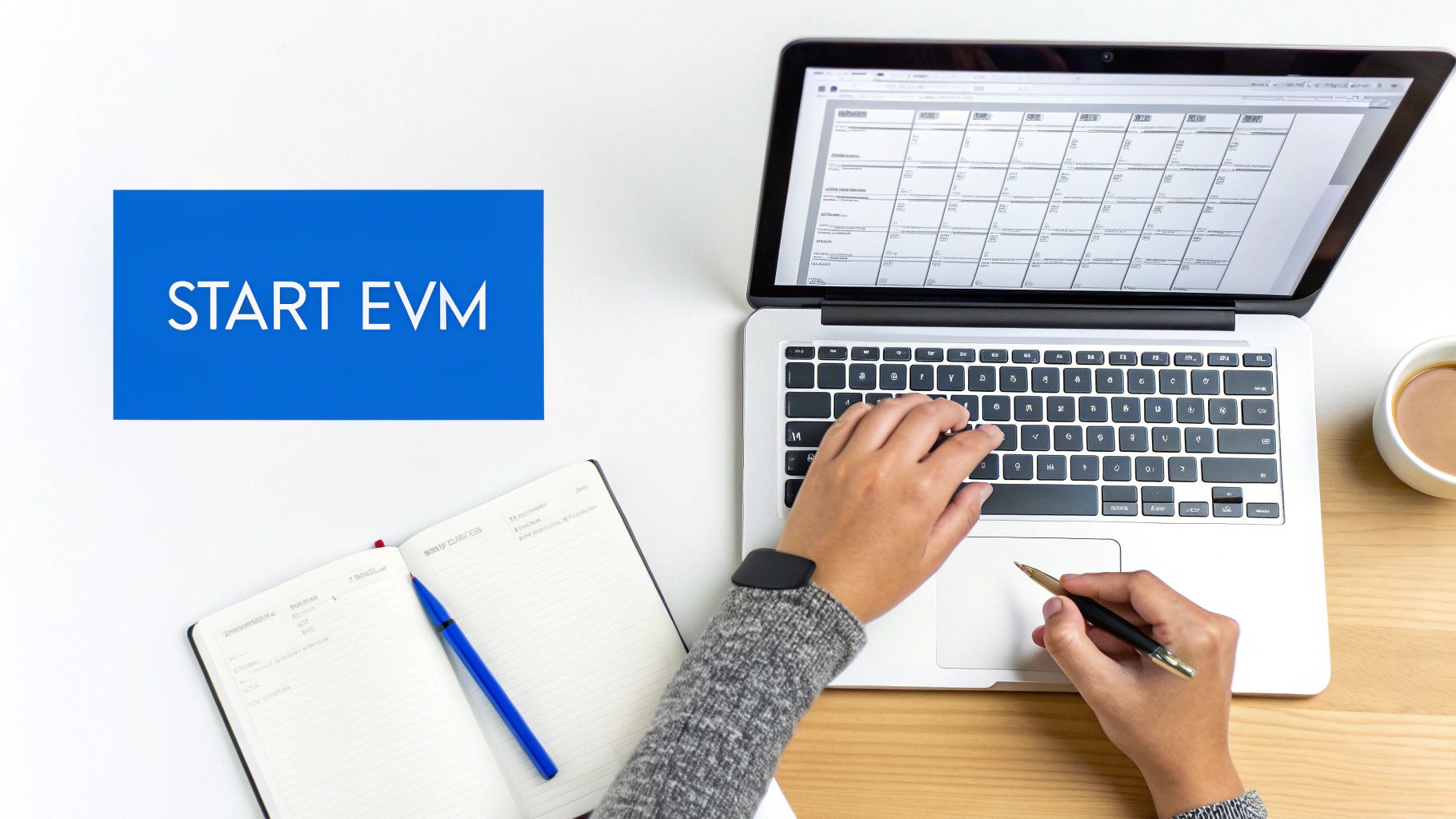 Overhead view of a person typing on a laptop showing a calendar, with a notebook and 'START EVM' text.