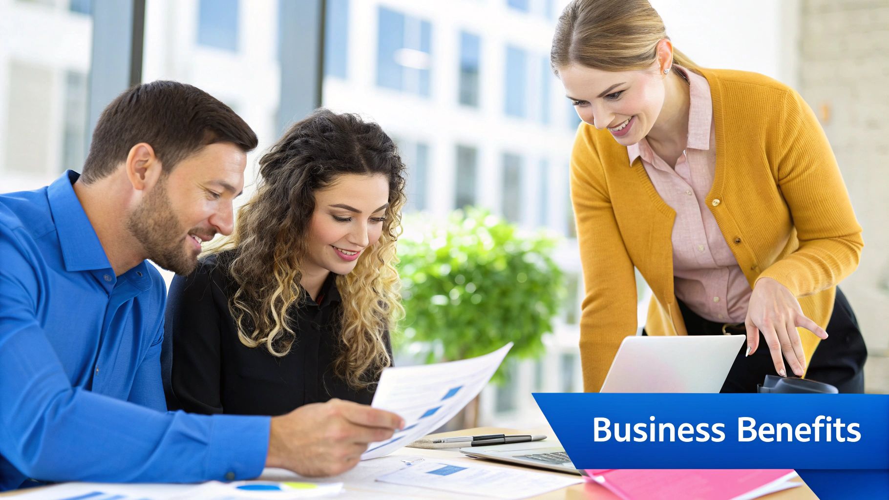 A team collaborating around a table, illustrating improved business outcomes.