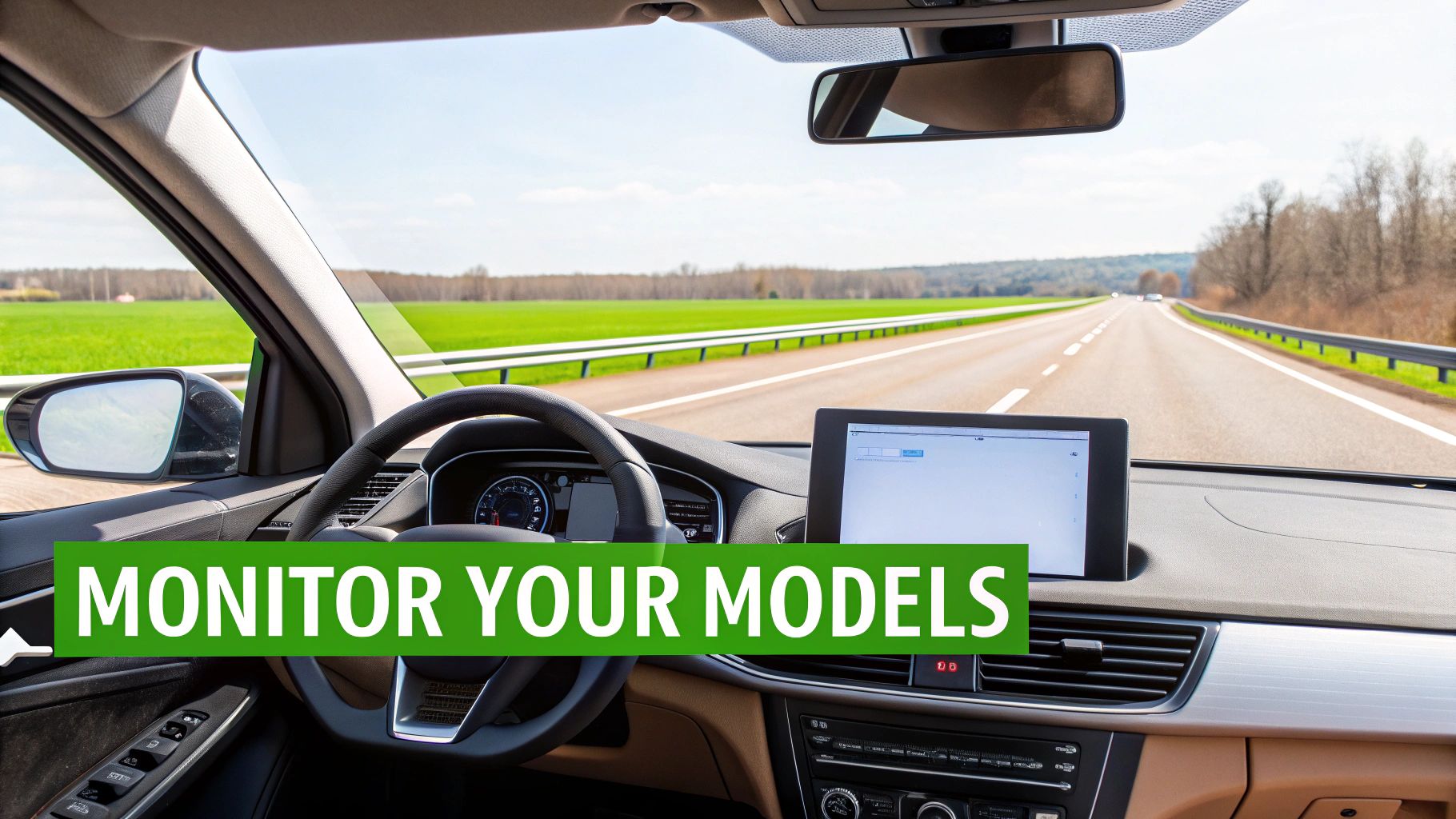 View from inside a car driving on a highway, with a dashboard tablet and 'MONITOR YOUR MODELS' text.