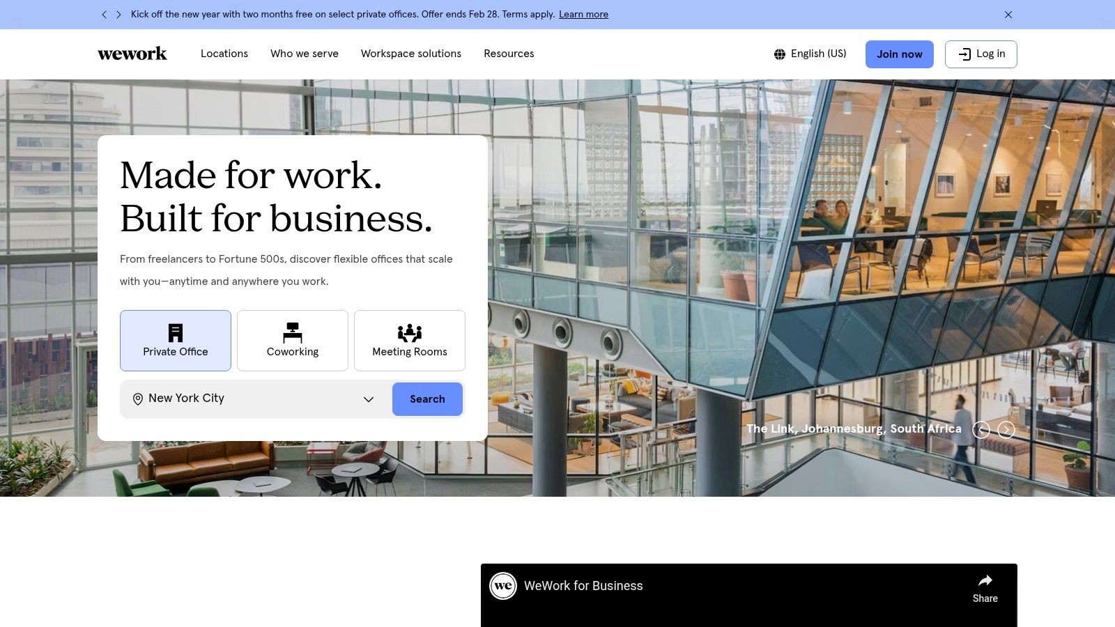 A sleek, modern WeWork common area featuring comfortable lounge seating and communal tables, representing the consistent aesthetic of their rentable work spaces.