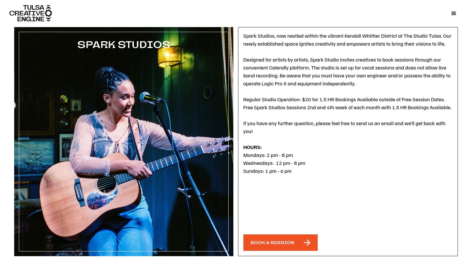 A recording artist working on a song in a studio setting, reflecting the creative process at Spark Studios.