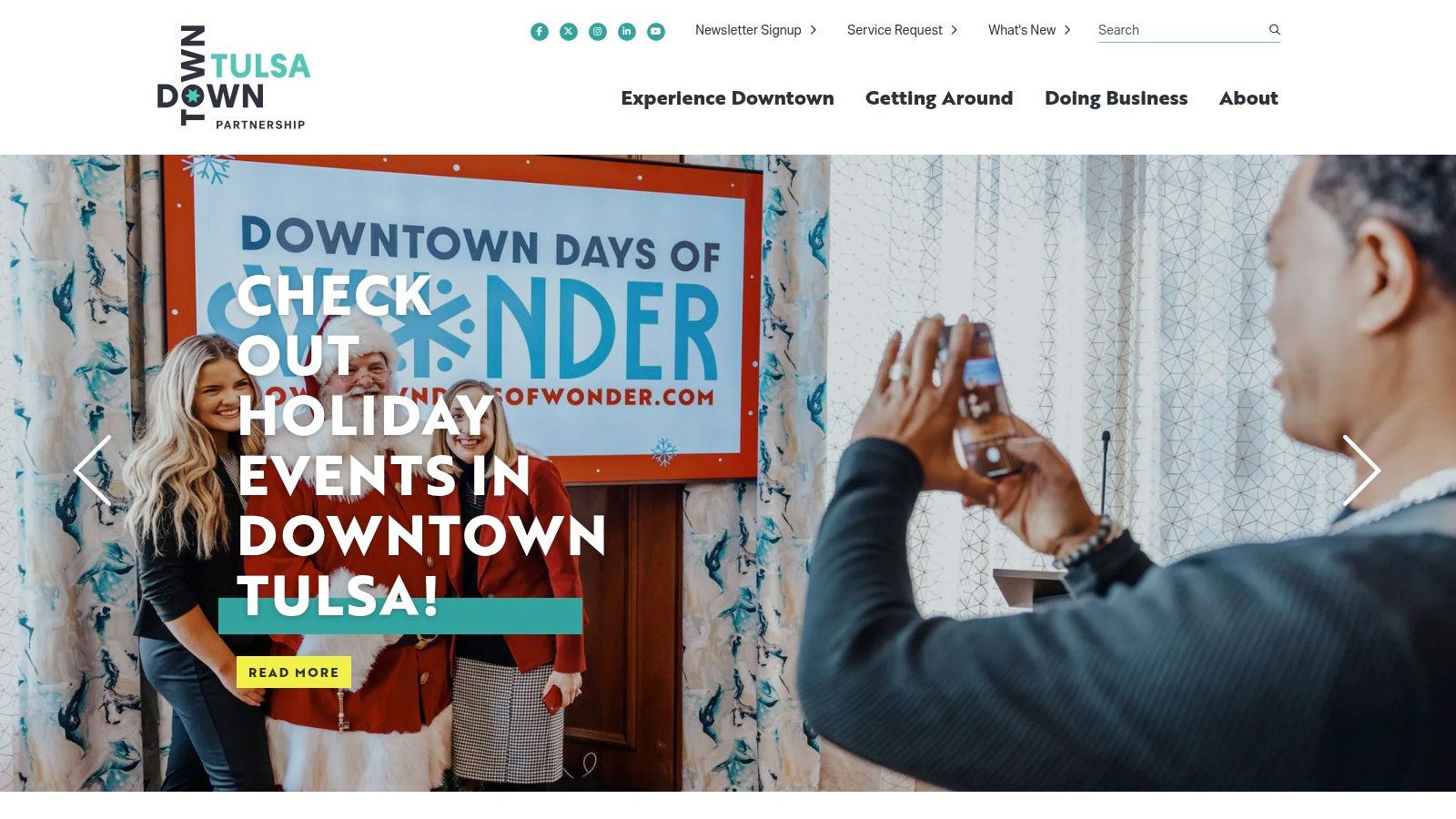 The Downtown Tulsa Partnership website showing a clean, image-rich layout of downtown events and guides.