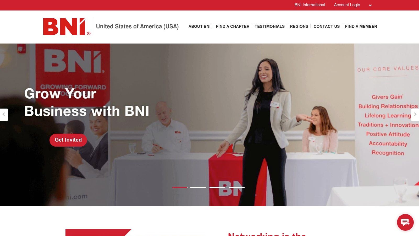 A diverse group of professionals engaged in a structured networking meeting, sitting around a conference table in a modern, professional setting.