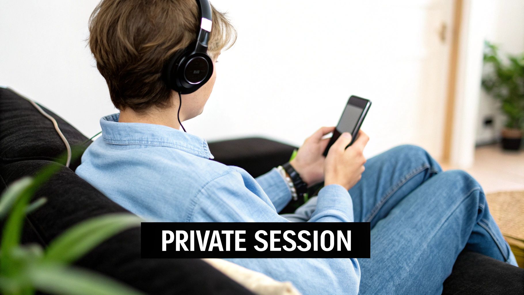 A person wearing headphones sits on a couch, looking at a smartphone with 'PRIVATE SESSION' text.