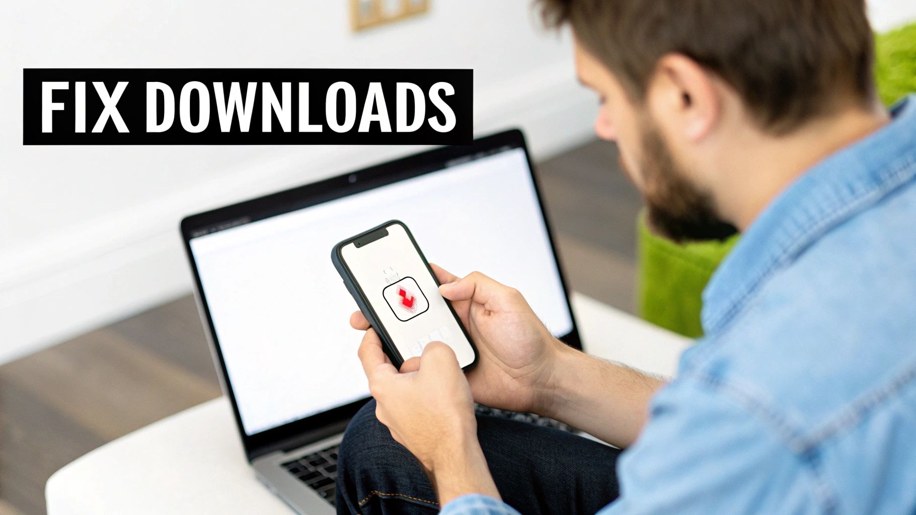 A person holds a smartphone displaying a download icon, with a laptop open and text 'FIX DOWNLOADS'.