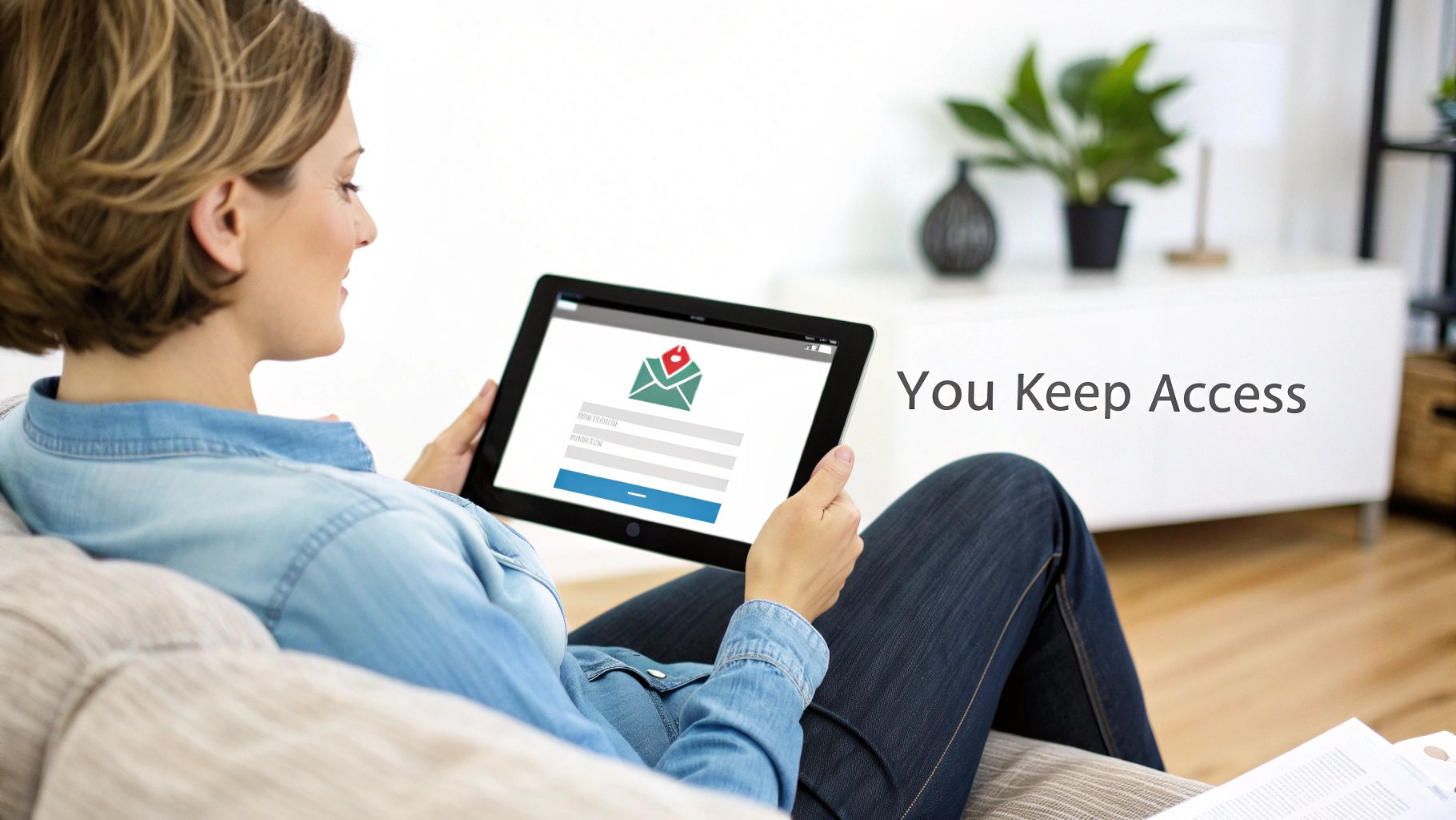A woman relaxing on a sofa, viewing an email login screen on a tablet with "You Keep Access" text.