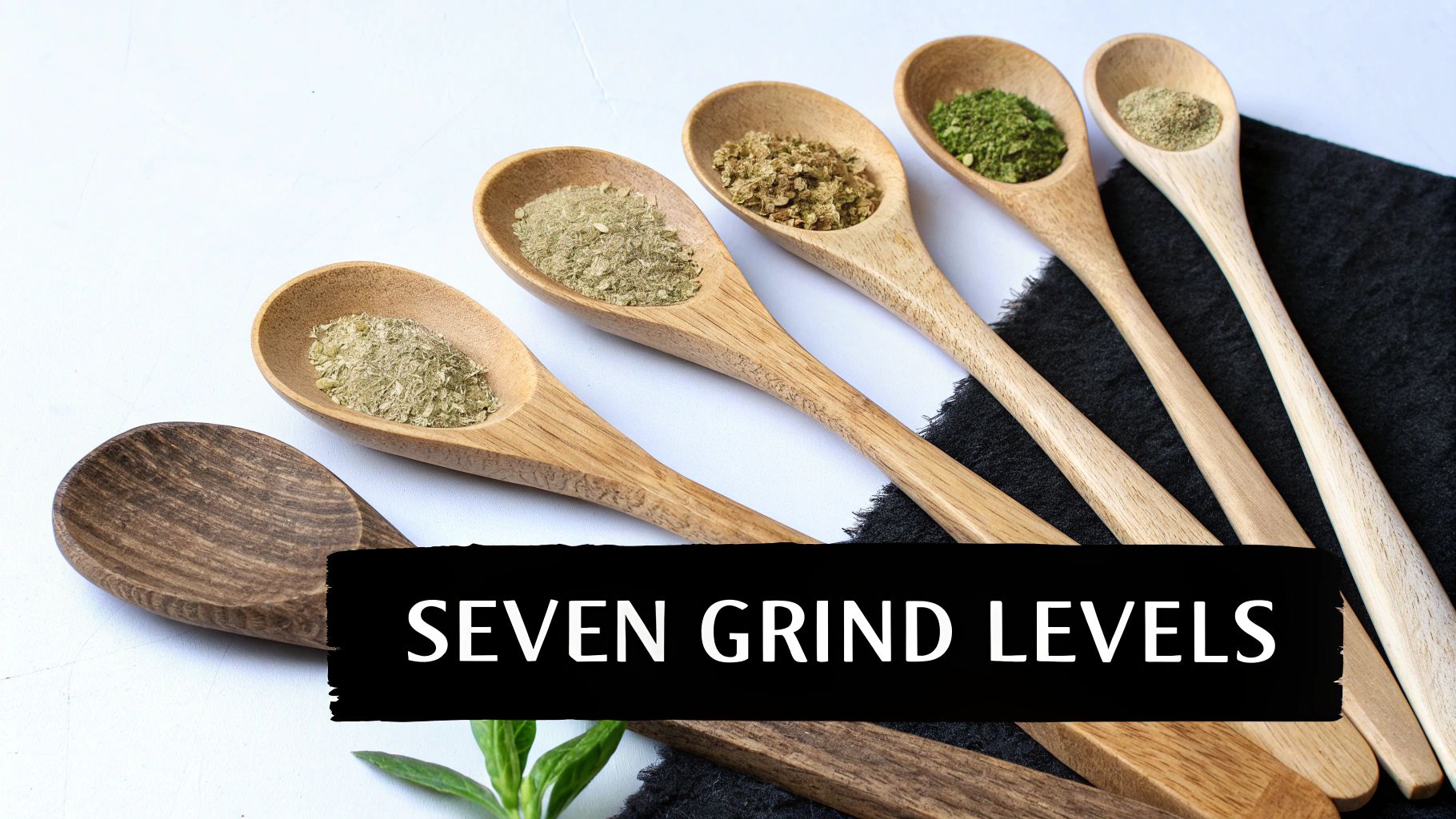 A person using a manual coffee grinder to grind coffee beans